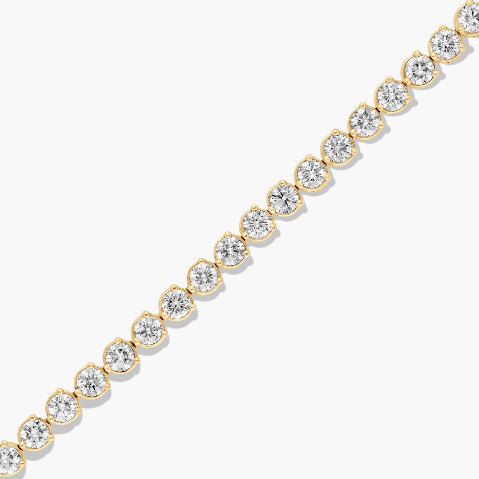 Flower Clasp Tennis Bracelet With 7 CTW Diamonds In 14K Yellow Gold By James Allen