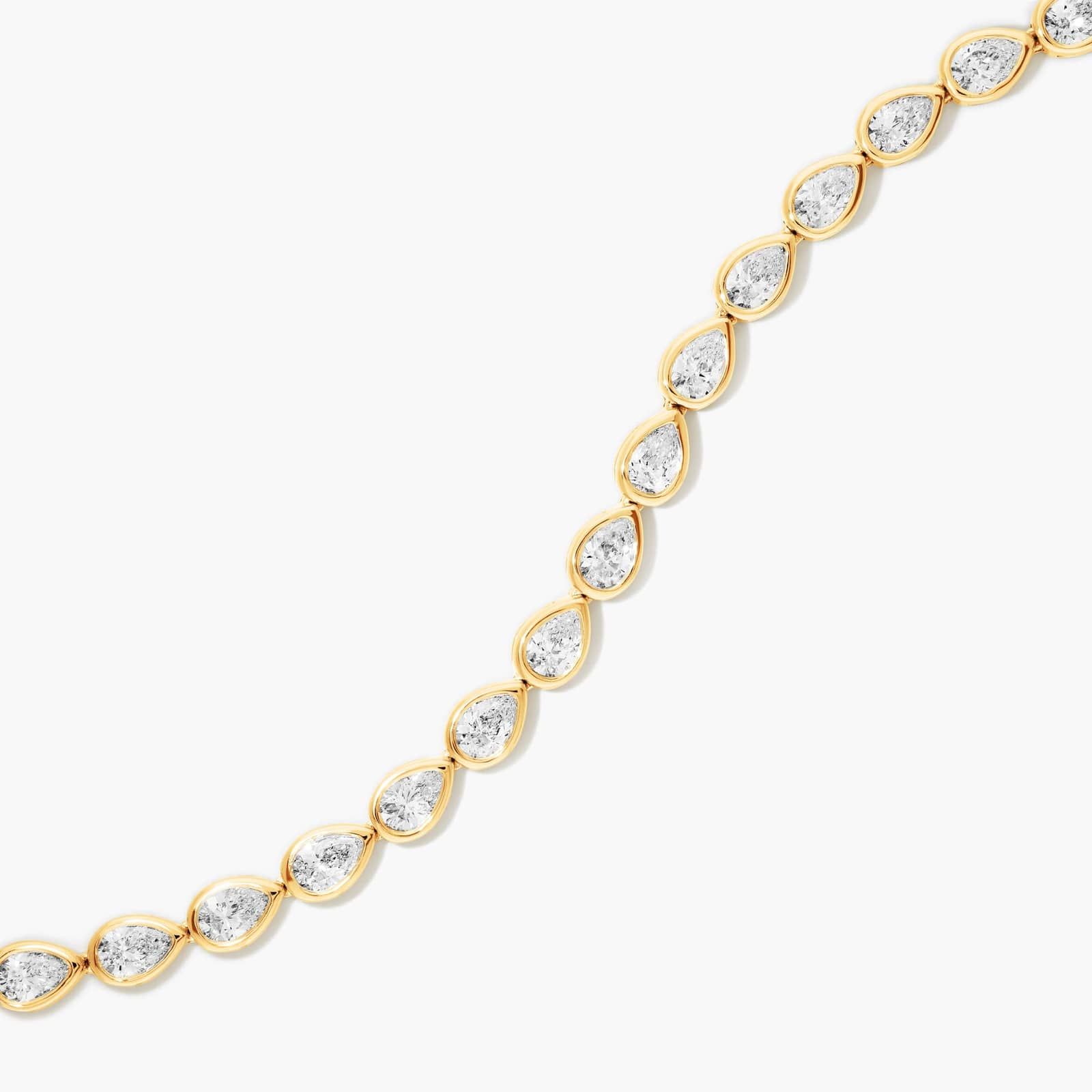 Bezel Tennis Bracelet With Pear Cut Diamonds In 14K Yellow Gold By James Allen