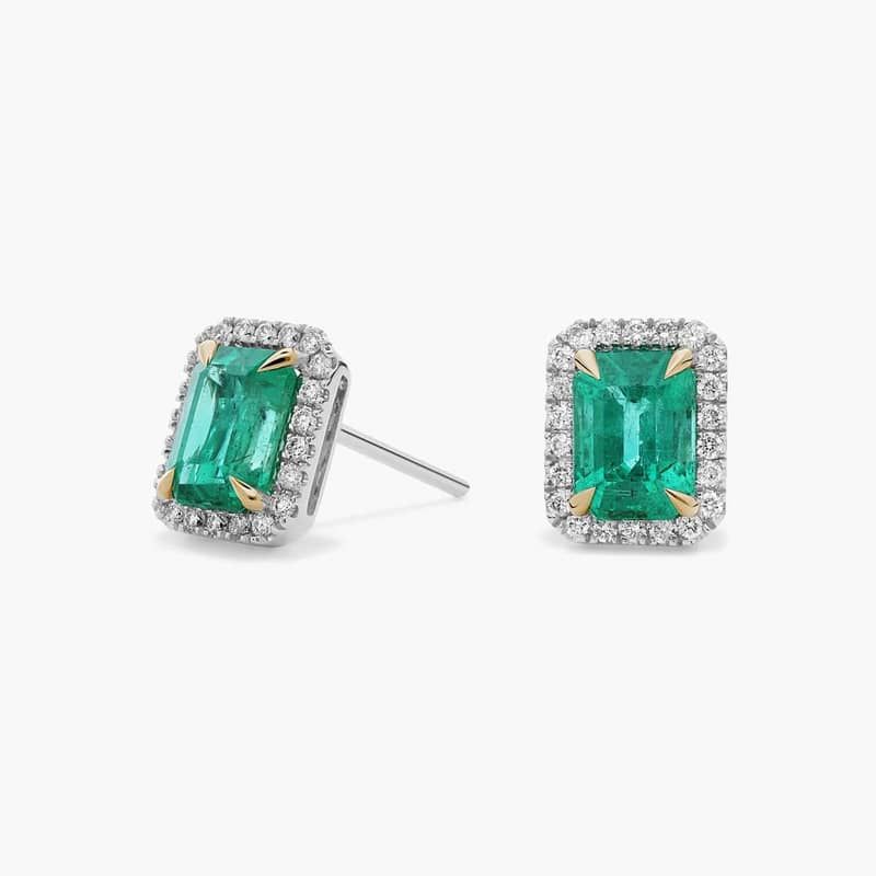 Emerald-Cut Emerald Stud Earrings with Diamond Halo in 14k White Gold with Yellow Gold Prongs (7x5mm)