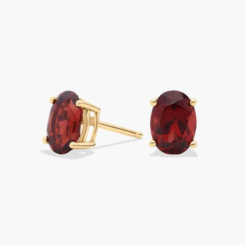 Oval Birthstone Garnet Stud Earrings in 14K Yellow Gold (7x5mm)