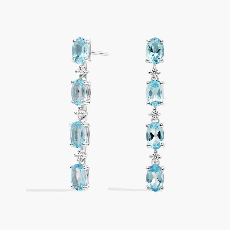 Oval Sky Blue Topaz Line Drop Fashion Earrings in Sterling Silver