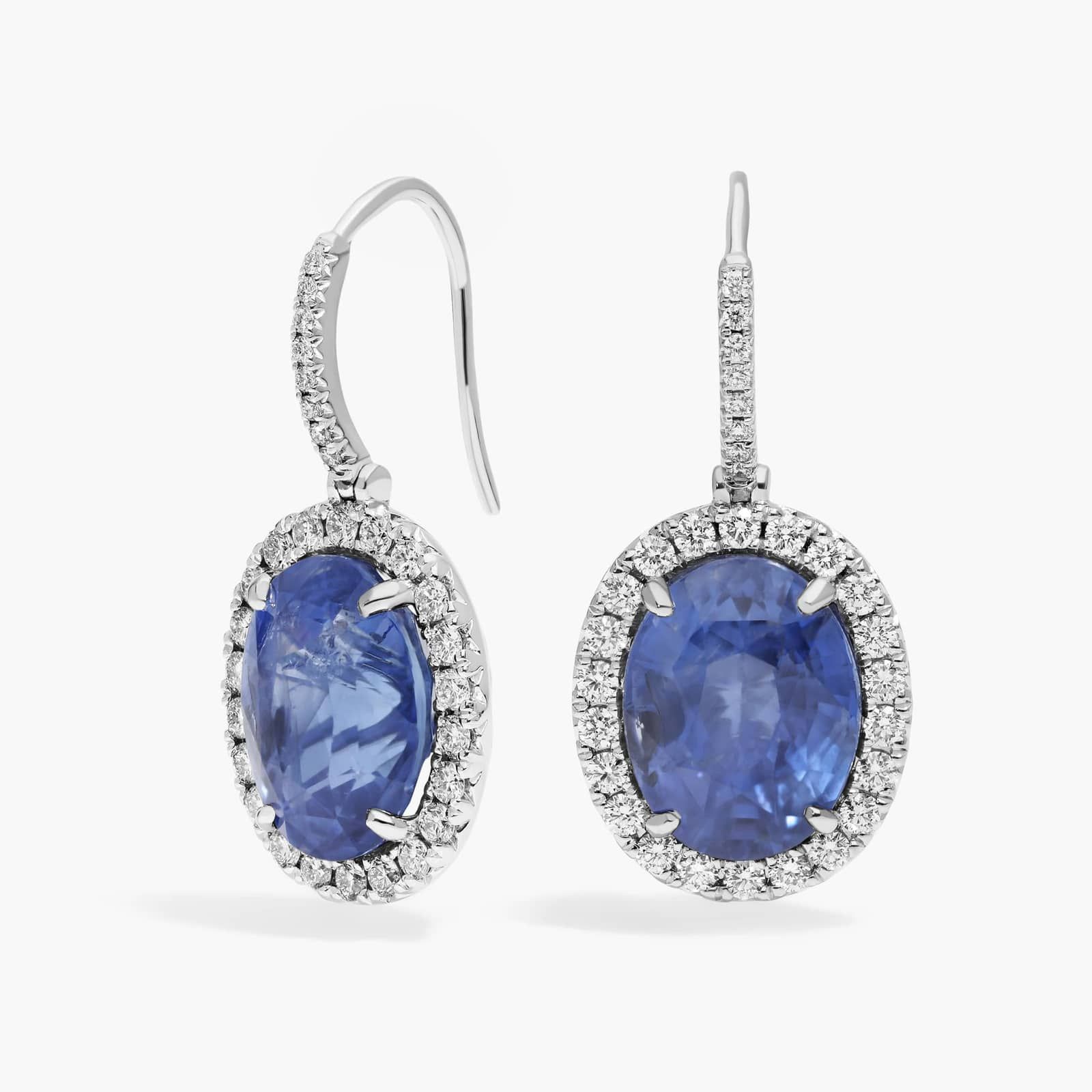 Oval Cut Sapphire & Diamond Halo Dangle Earrings with 1 CTW Round Cut Diamonds in Platinum