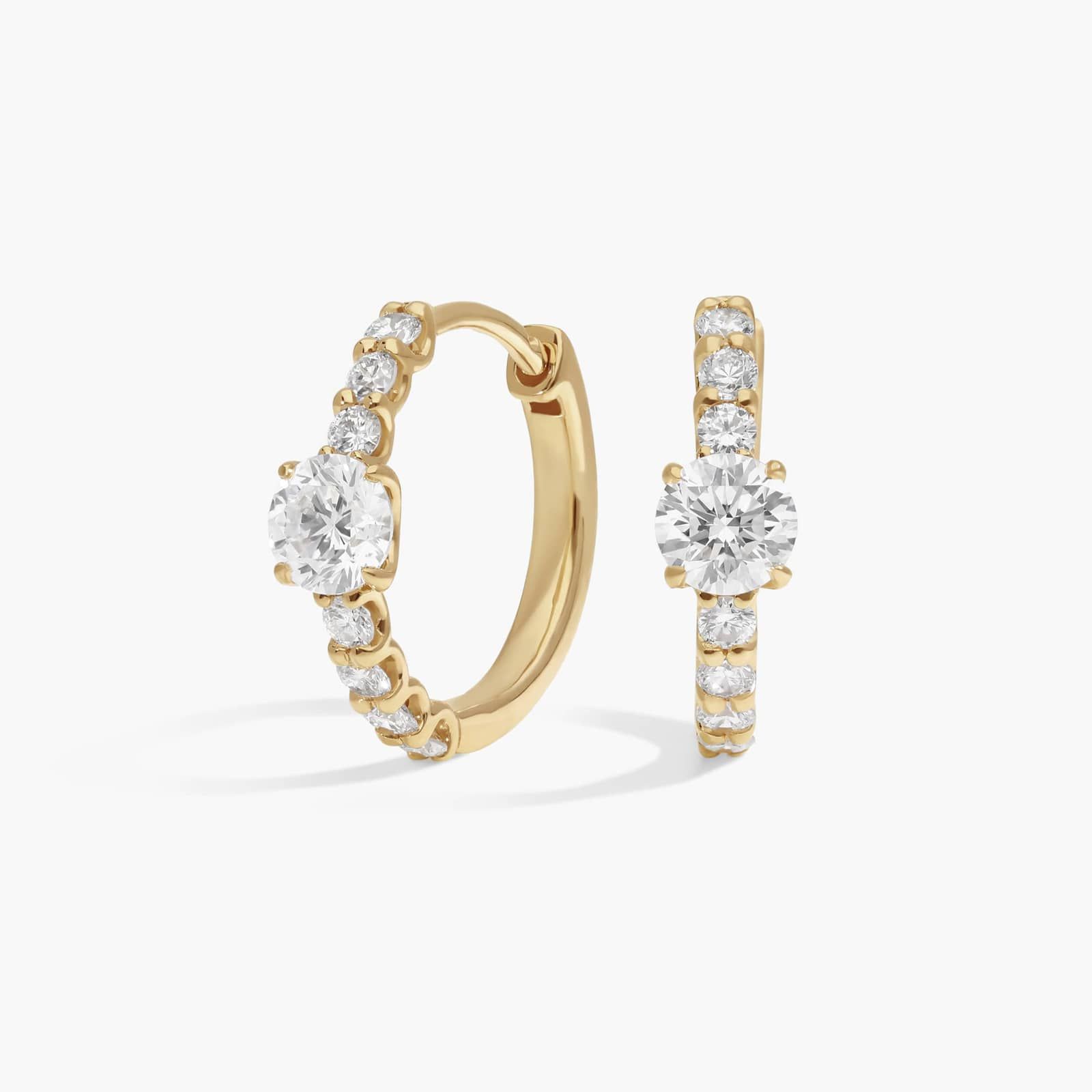 Center Diamond Huggie Earrings with 1 CTW Round Cut Diamonds in 14K Yellow Gold