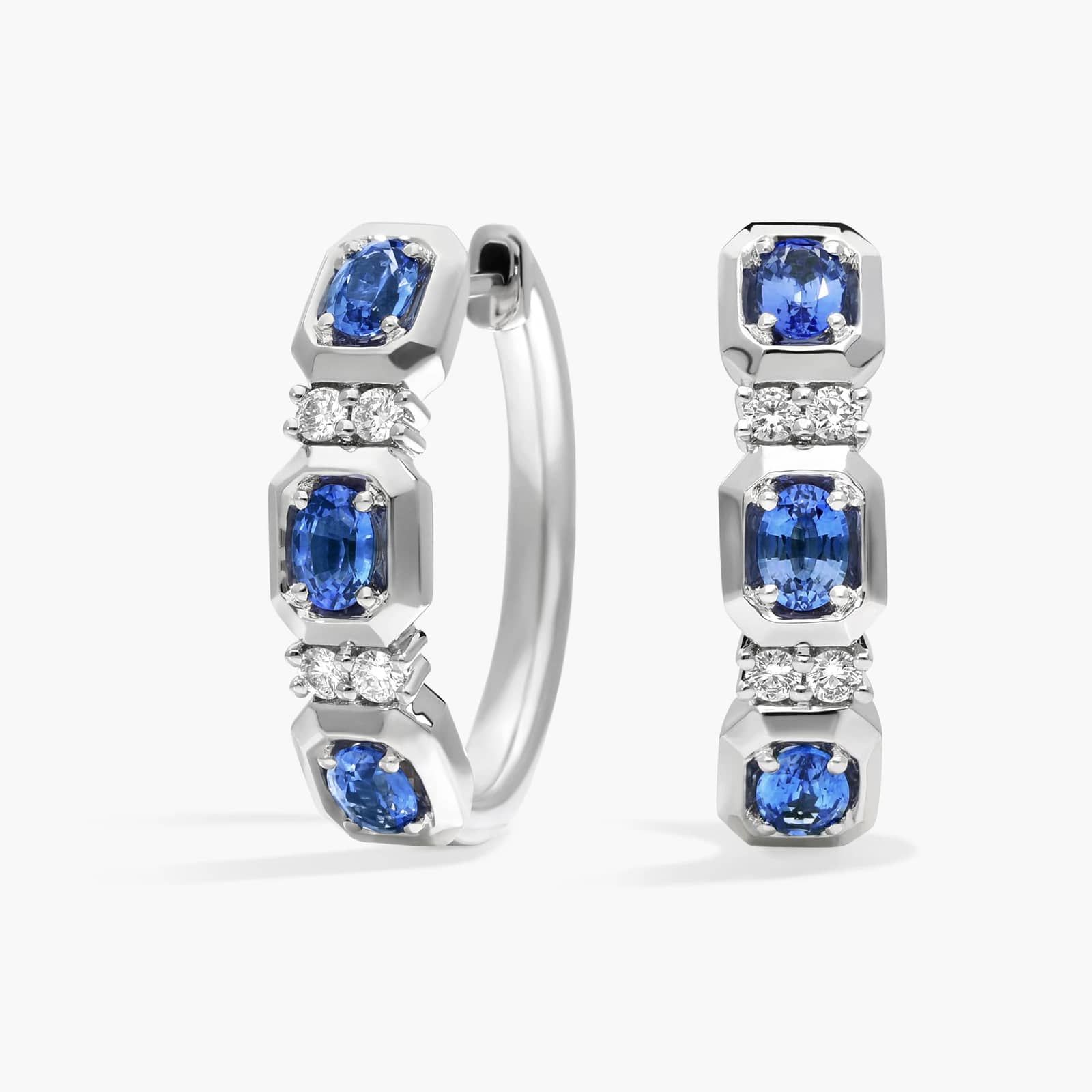 Oval Cut Blue Sapphire and Diamond Hoop Earrings In 14K White Gold
