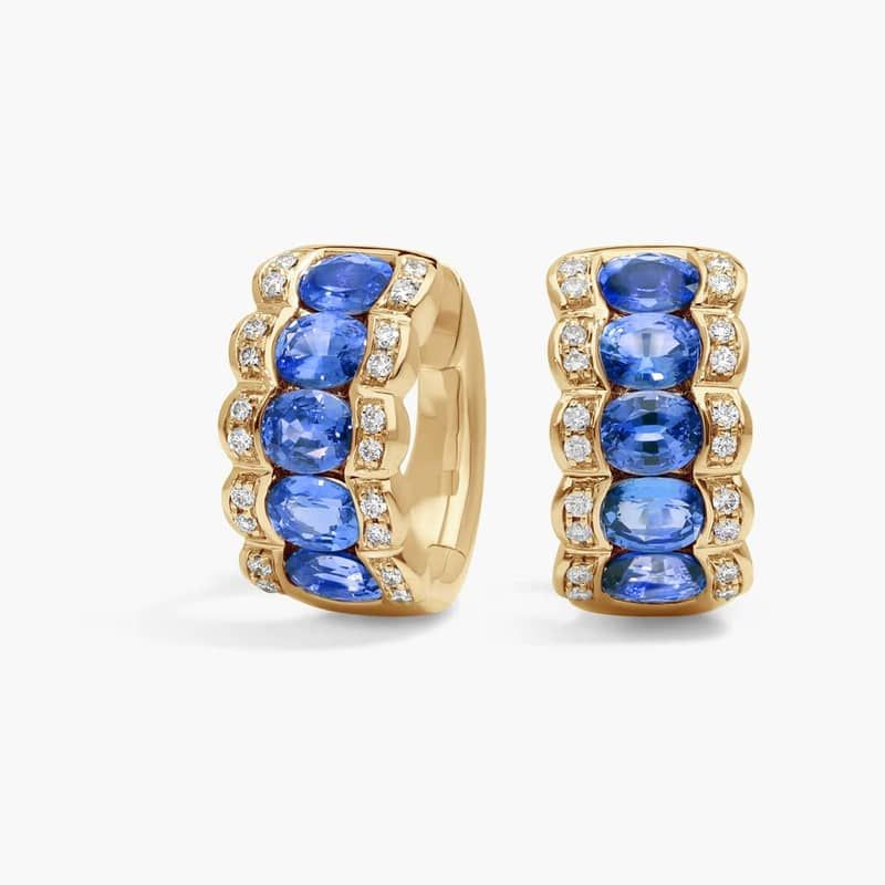 East-West Oval Cut Blue Sapphire and Pavé Diamond Hoop Earrings In 14K Yellow Gold