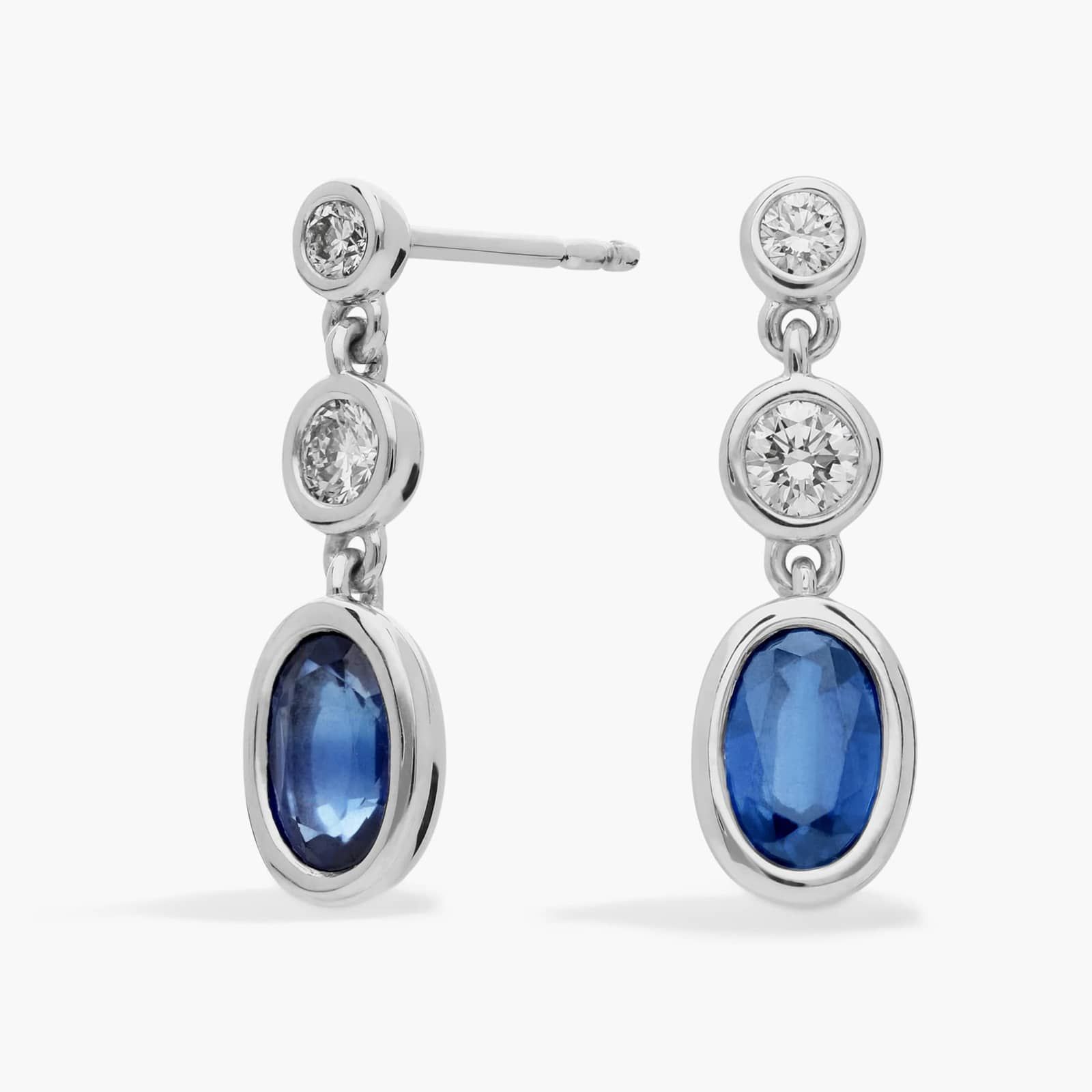 Blue Sapphire and Diamond Drop Earrings with 0.25 CTW Round Cut Diamonds in 14K White Gold Bezel Setting