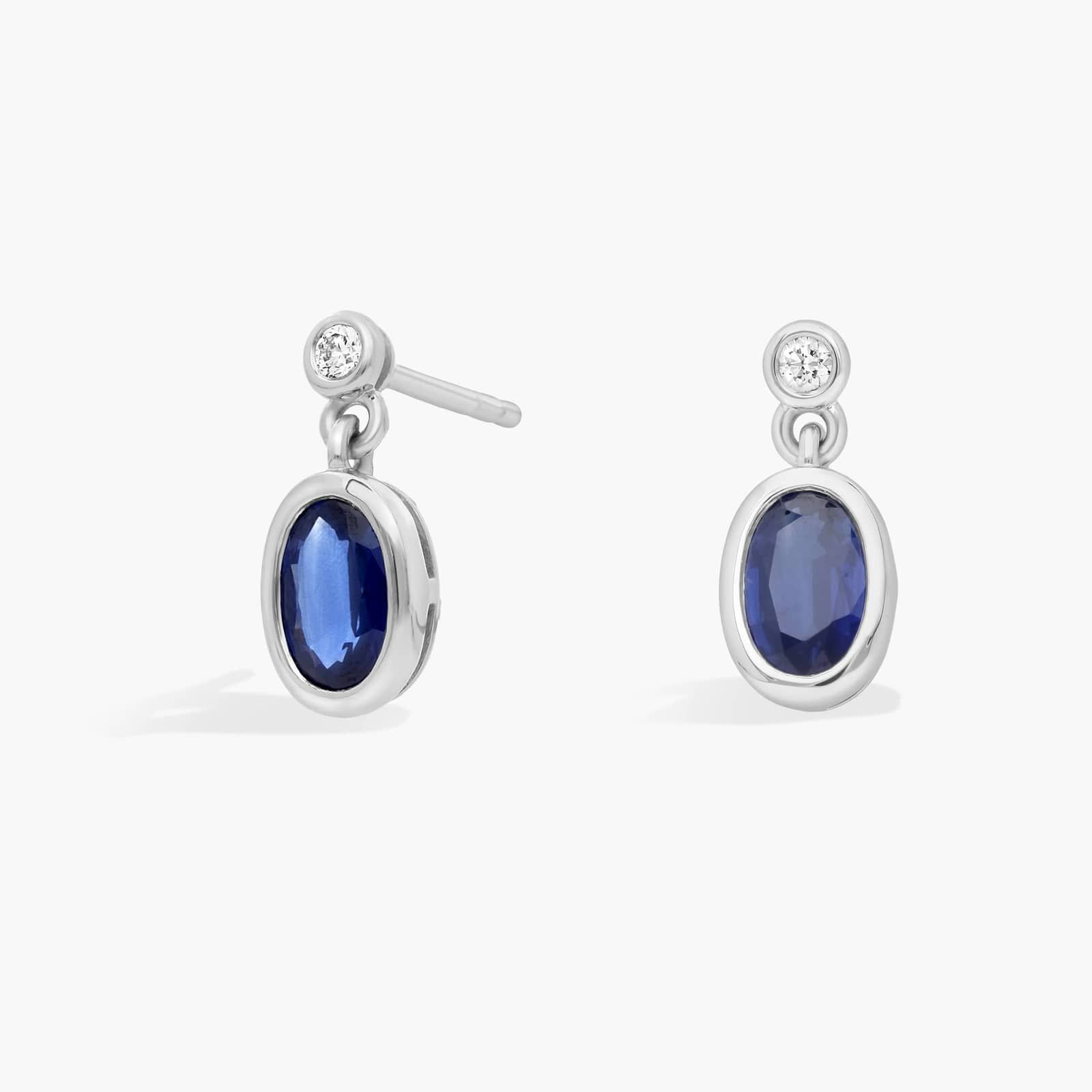 Blue Sapphire and Diamond Single Drop Earrings in 14K White Gold Bezel Setting