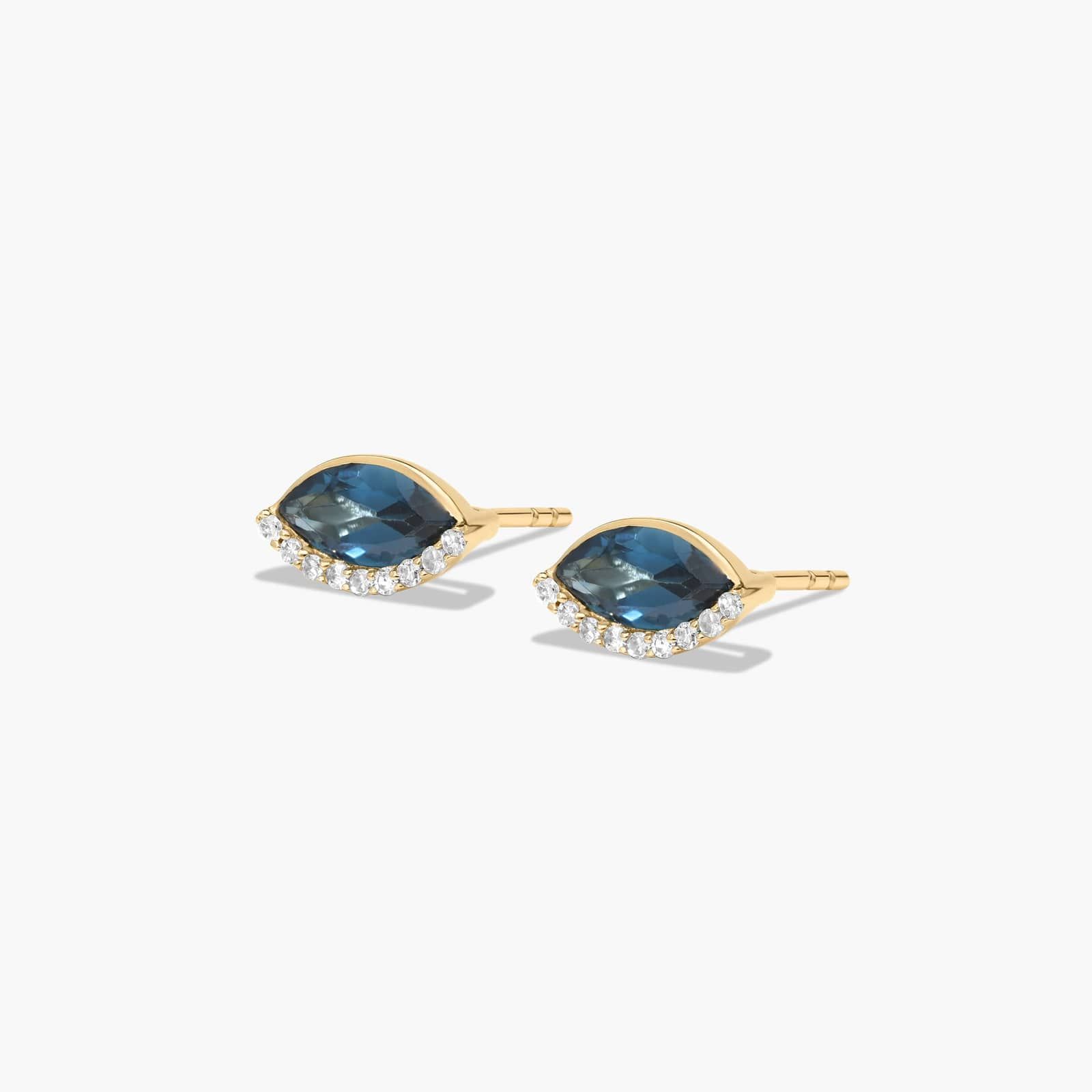 Radiant Reflections Marquise Cut Blue Topaz Earrings In 14K Yellow Gold