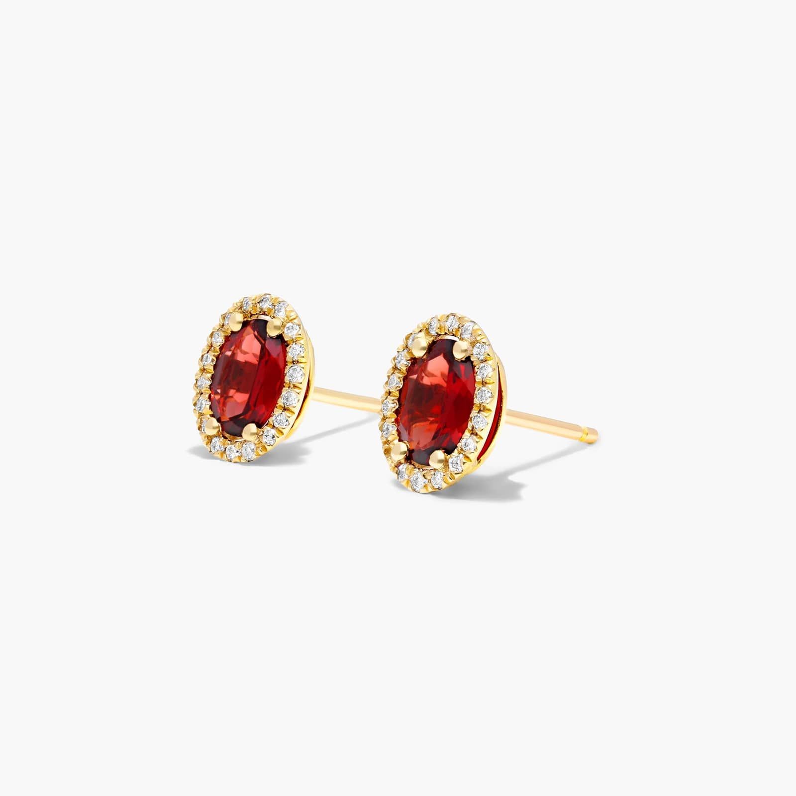 Oval Cut Garnet And Diamond Halo Stud Earrings In 14K Yellow Gold By James Allen