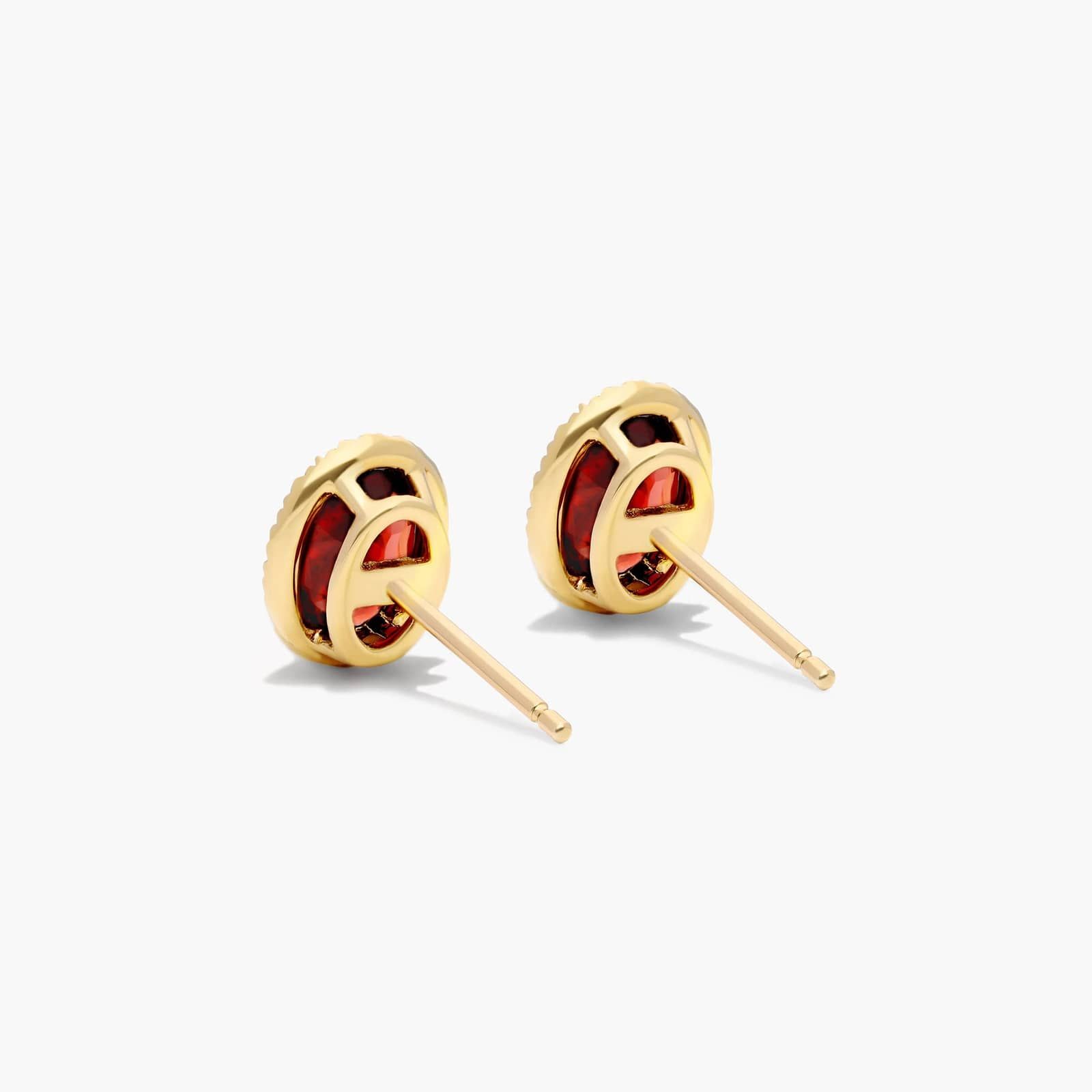 Oval Cut Garnet And Diamond Halo Stud Earrings In 14K Yellow Gold By James Allen