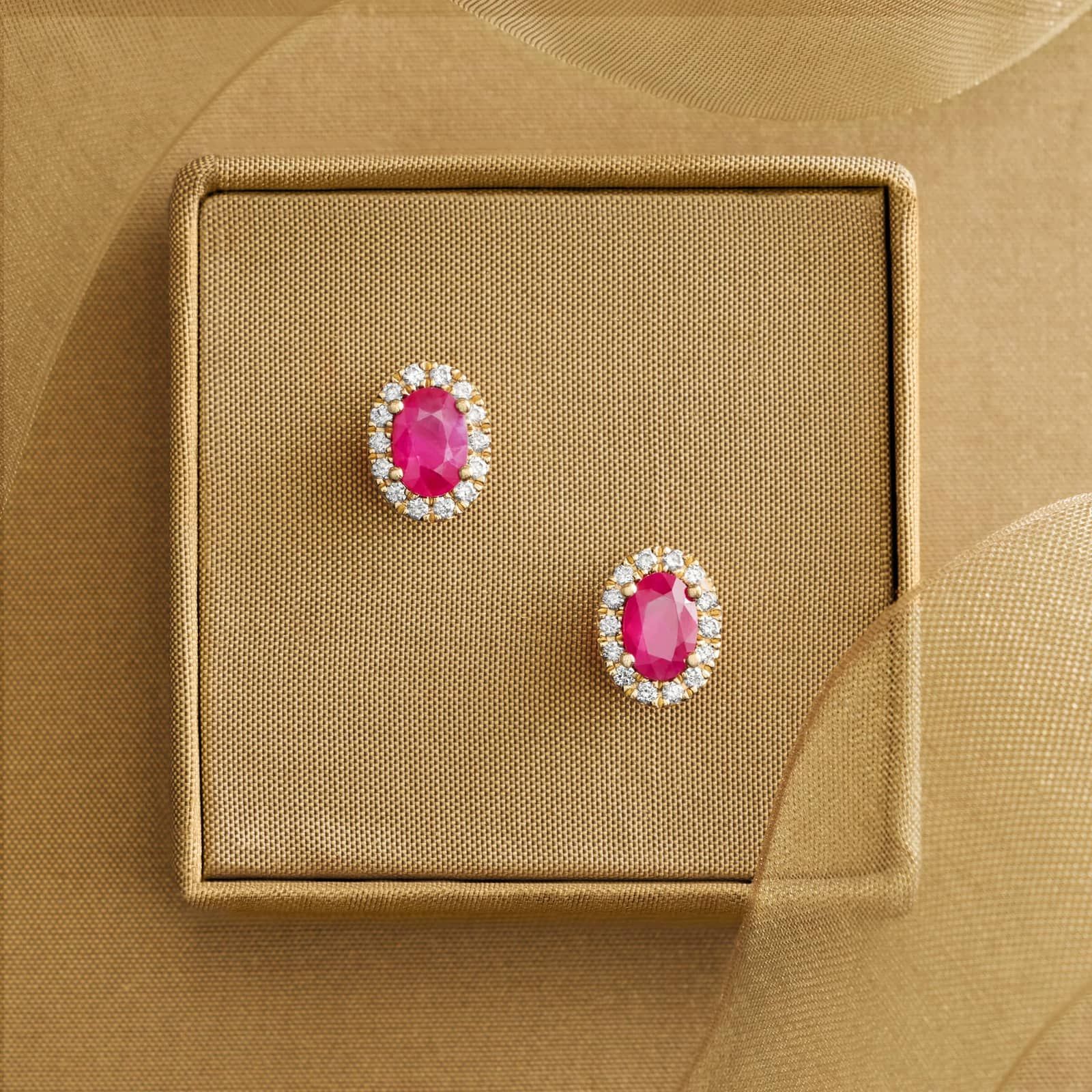 Ruby Studs with Diamond Halo in 14K Yellow Gold (1/5 ct. tw.)