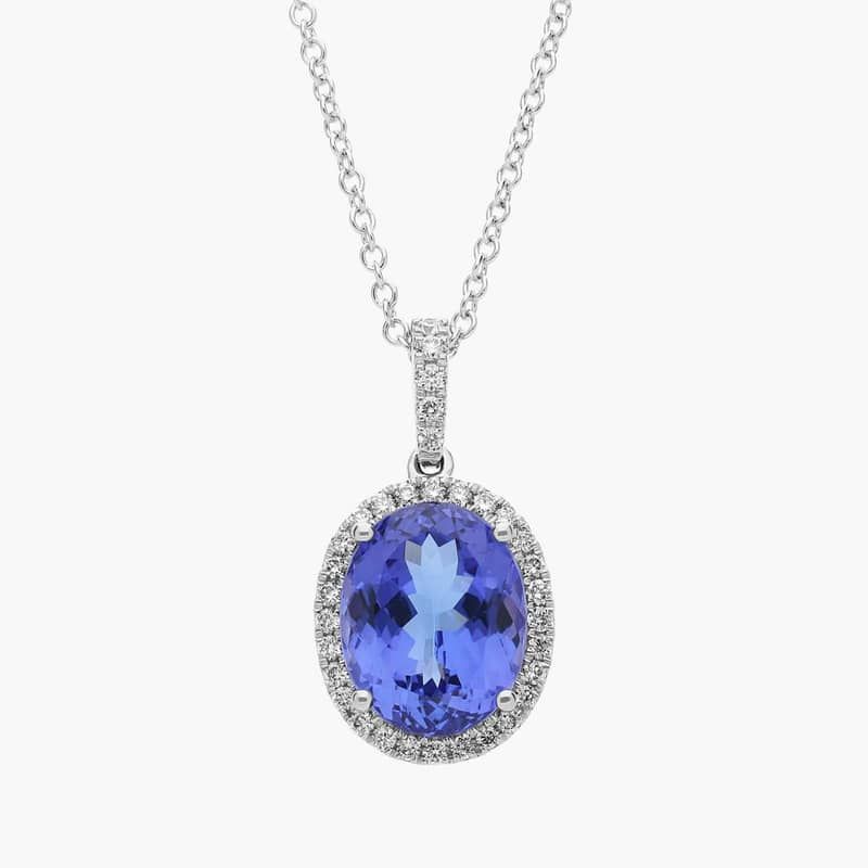 Oval Tanzanite and Diamond Halo Pendant in 14k White Gold (10x8mm)