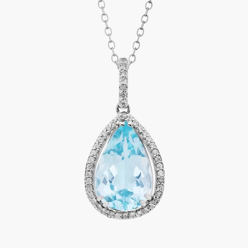 Sky Blue Topaz Elegant Halo Pendant in Sterling Silver (14x9mm)