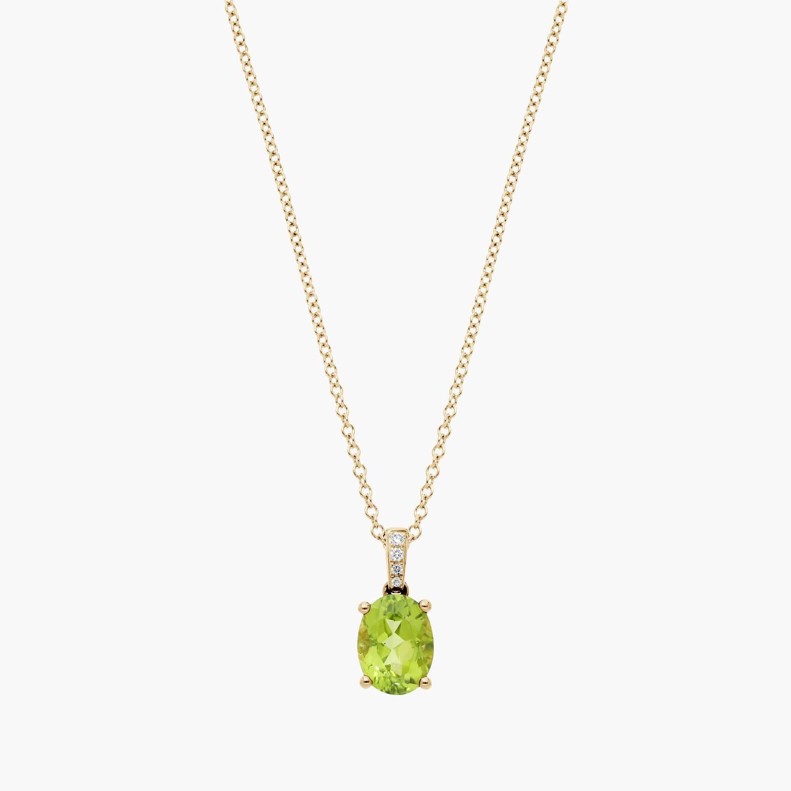 Oval Peridot and Diamond Pendant in 14k Yellow Gold (8x6mm)
