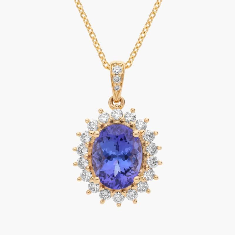 Oval Tanzanite Sunburst Pendant in 14k Yellow Gold (10x8mm)