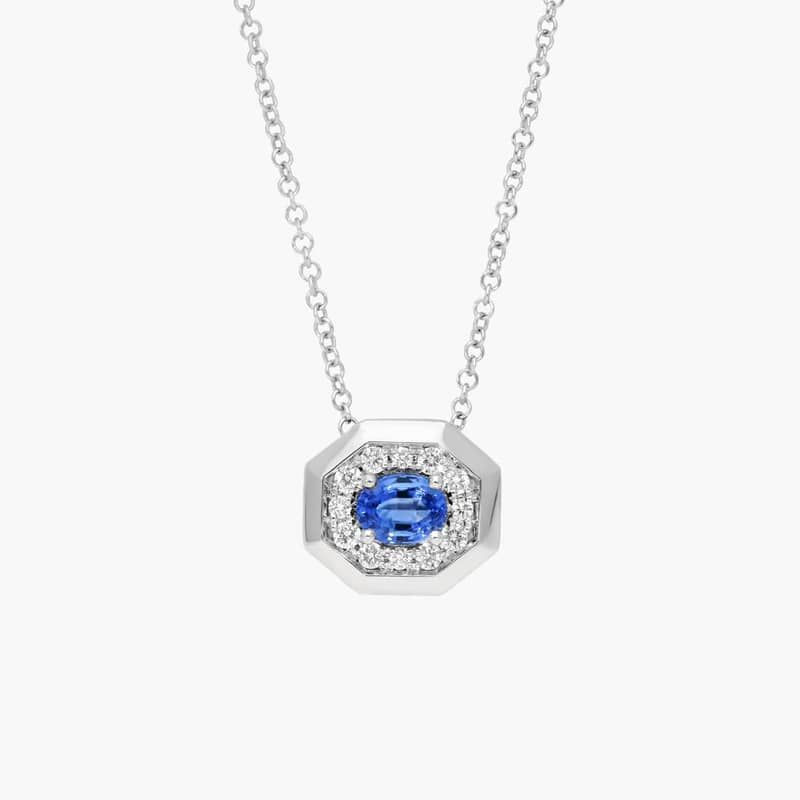 Oval Cut Blue Sapphire and Pavé Diamond Pendant Necklace In 14K White Gold