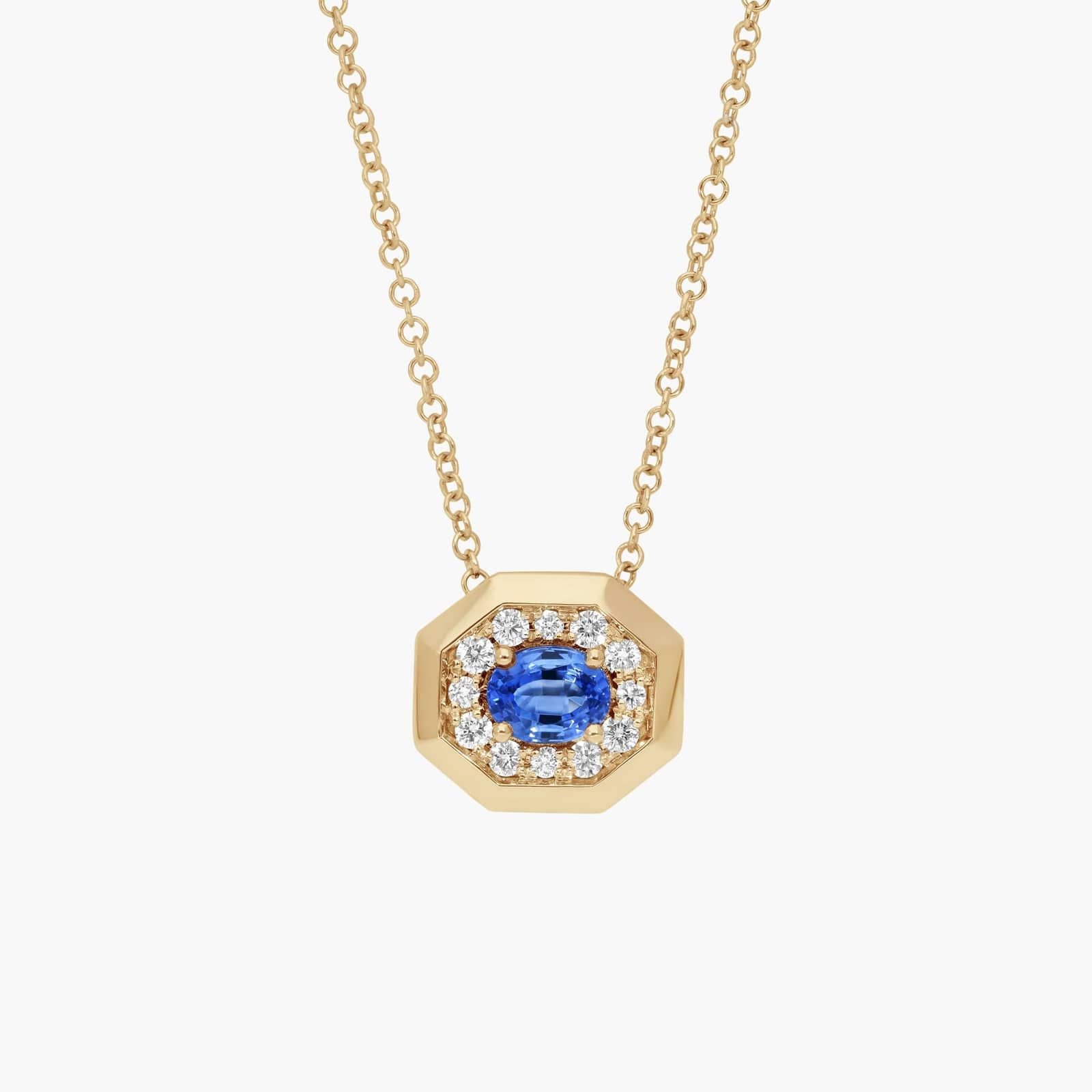 Oval Cut Blue Sapphire and Pavé Diamond Pendant Necklace In 14K Yellow Gold