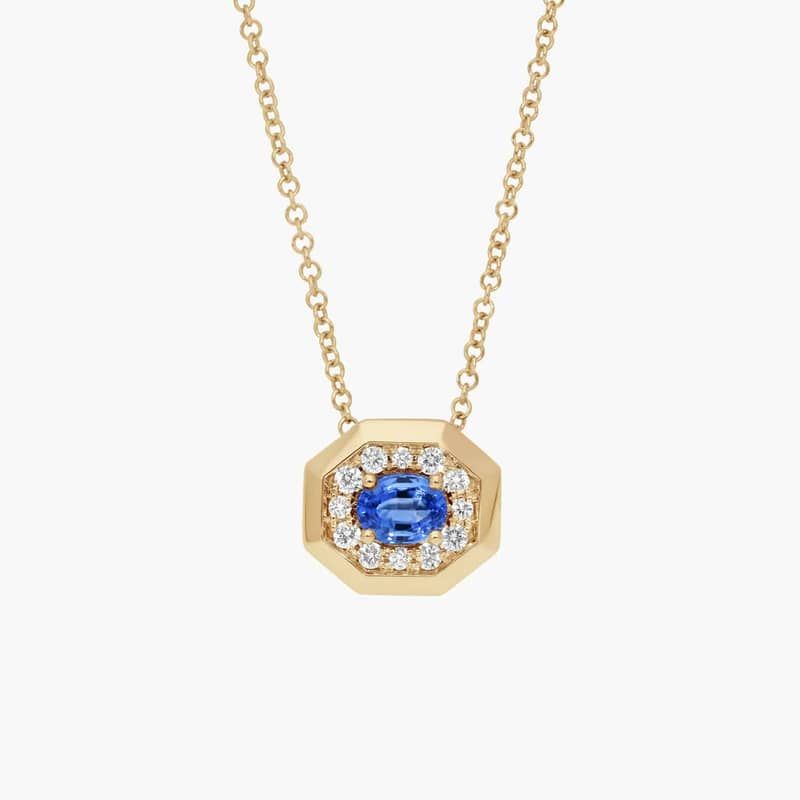 Oval Cut Blue Sapphire and Pavé Diamond Pendant Necklace In 14K Yellow Gold