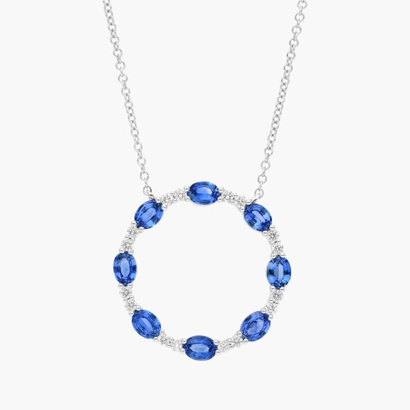Oval Cut Blue Sapphire and Diamond Circle Pendant Necklace In 14K White Gold