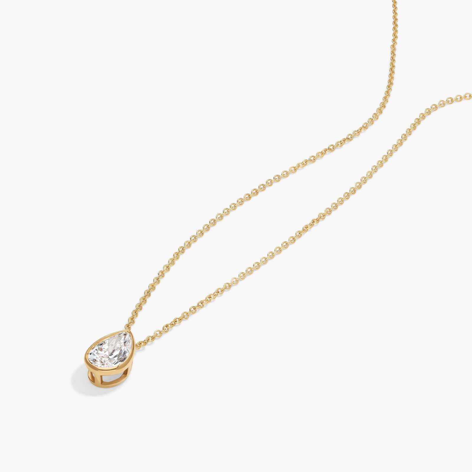 Bezel Solitaire Pendant Necklace With 0.75 CTW Pear Shaped Diamond in 14K Yellow Gold By James Allen