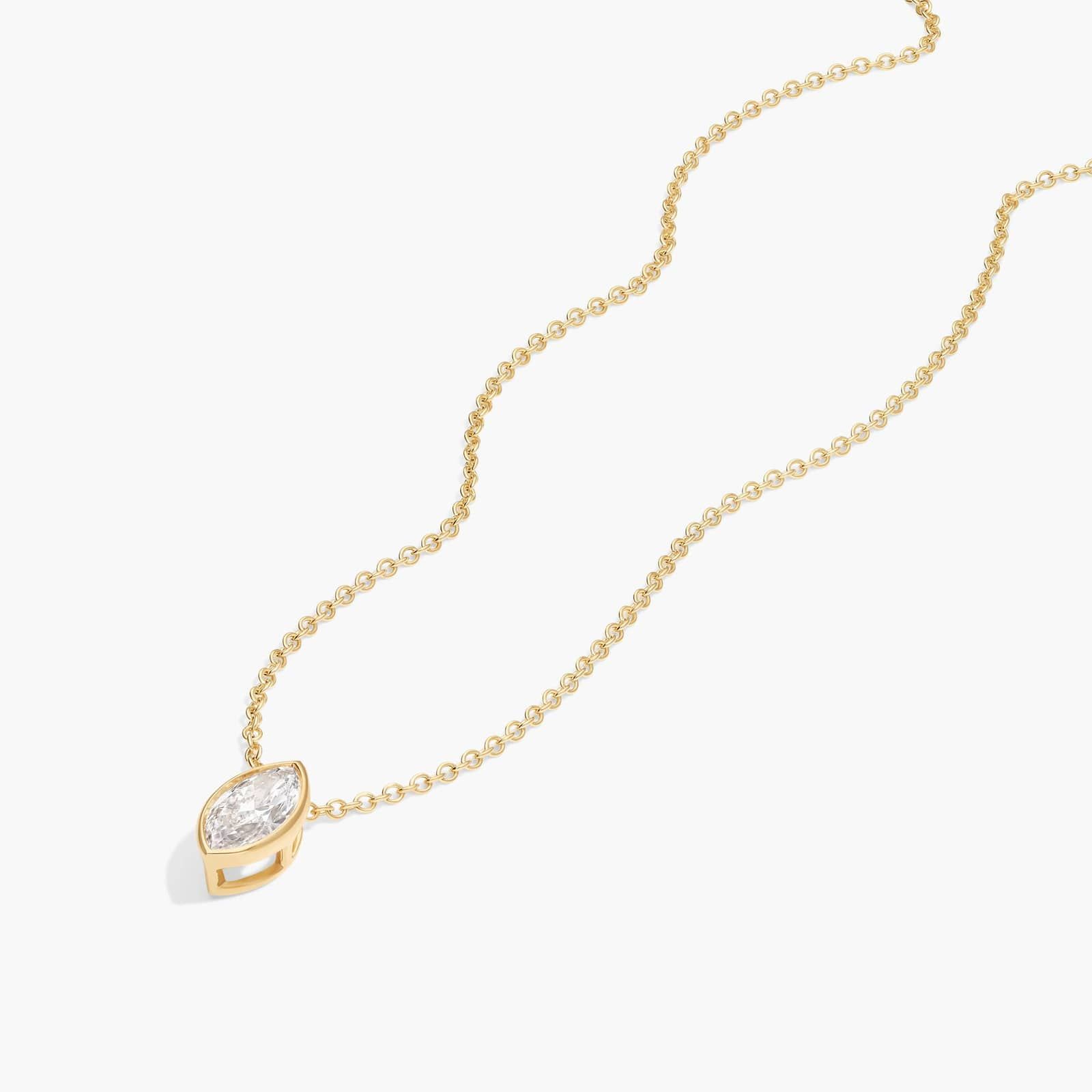 Bezel Solitaire Pendant Necklace With 0.5 CTW Marquise Cut Diamonds in 14K Yellow Gold By James Allen