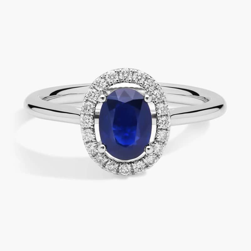 Floating Oval Sapphire and Diamond Micropavé Diamond Halo Ring in 14k White Gold (7x5mm)