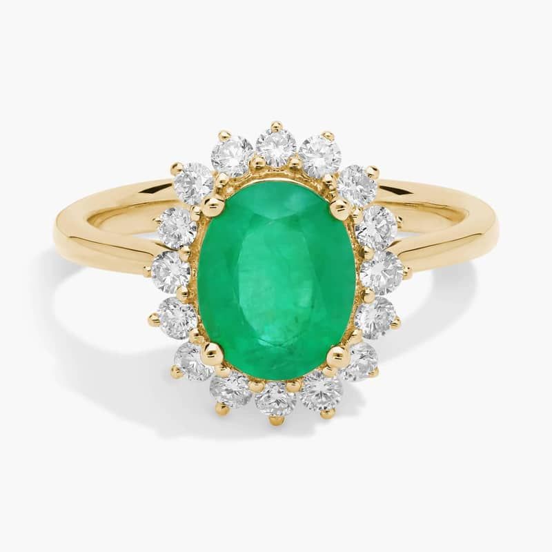 Oval Emerald and Diamond Sunburst Halo Ring 14k in Yellow Gold (9x7mm)