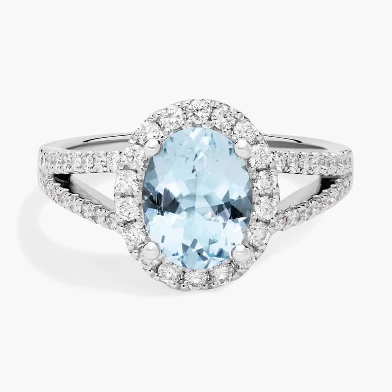 Oval Aquamarine and Diamond Halo Split Shank Ring (9x7mm)