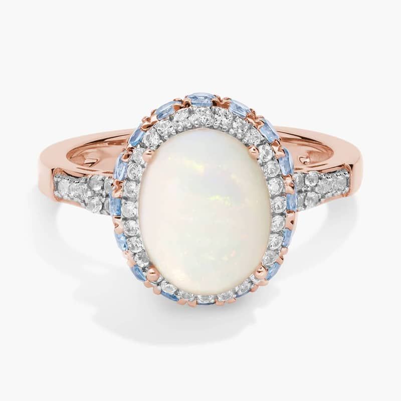 Oval Opal and Swiss Blue Topaz Halo Ring in 14k Rose Gold