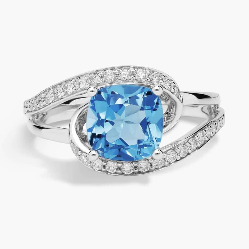 Cushion Cut Swiss Blue Topaz Ring with Twisting Halo in 14k White Gold