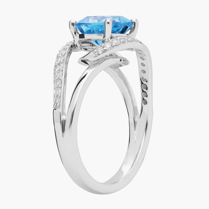 Cushion Cut Swiss Blue Topaz Ring with Twisting Halo in 14k White Gold