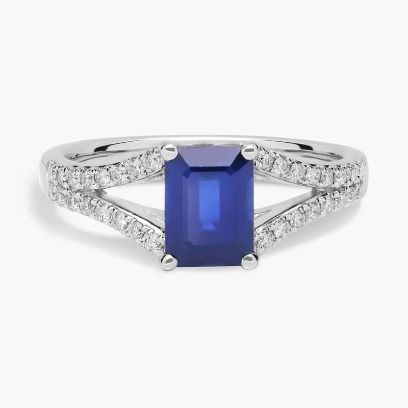 Emerald Cut Sapphire Split Shank Ring in 14k White Gold (7x5mm)