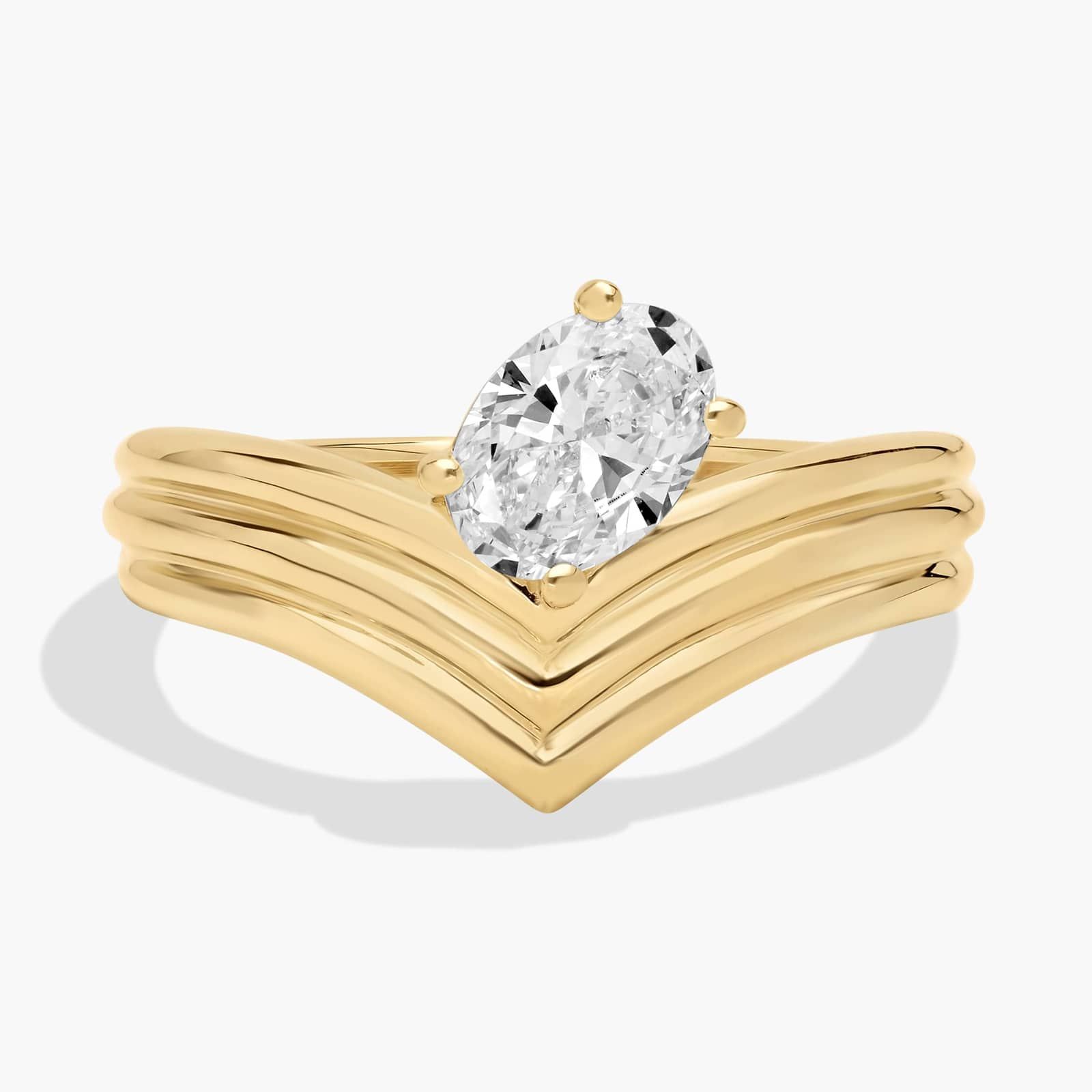 Oval Solitaire Diamond 3 Row Chevron Ring in 14K Yellow Gold (3/4 Ct. Tw.)