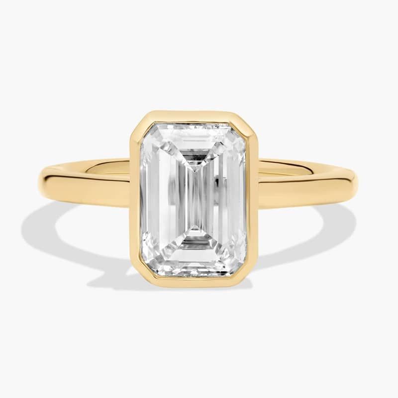 Lab Grown Emerald Cut Diamond Bezel Ring in 14K Yellow Gold (3 Ct. Tw.)