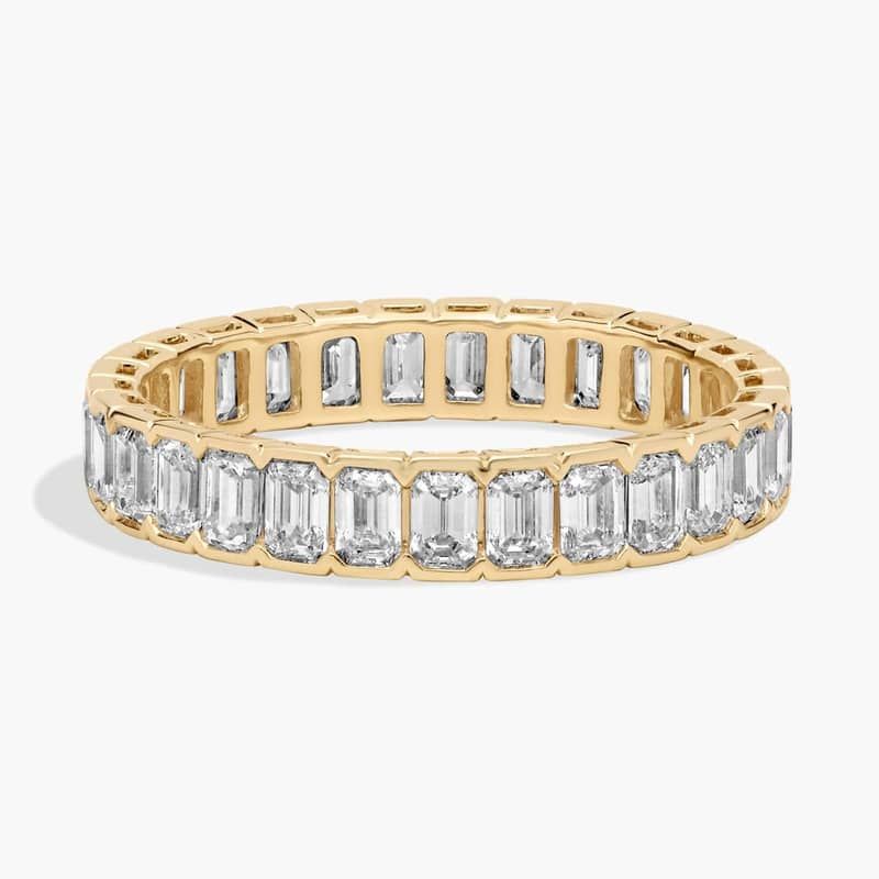 Emerald Cut Diamond Partial Bezel Eternity Ring in 14k Yellow Gold (2 Ct. Tw.)