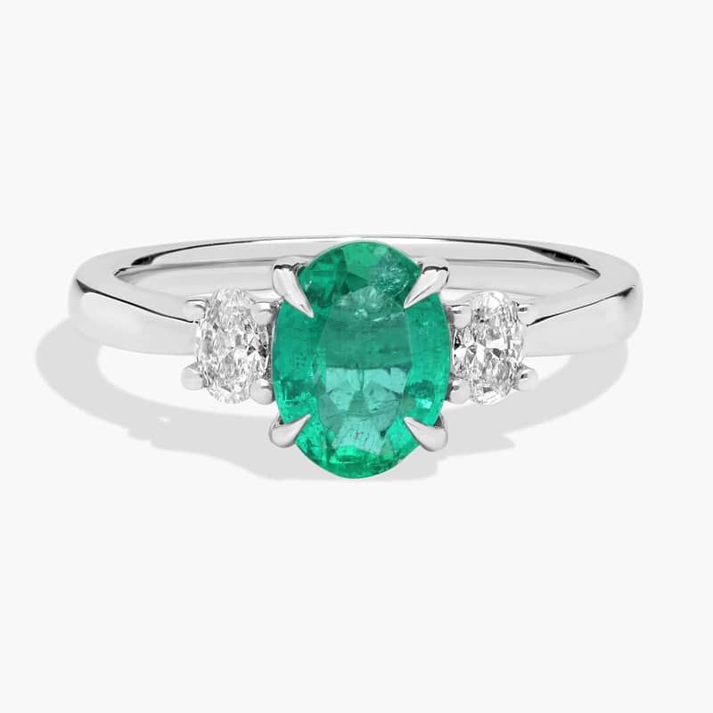 Oval Emerald and Diamond Side Stone Preset Ring in Platinum (8x6mm)