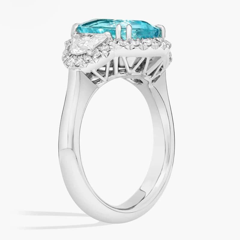 Extraordinary Collection: Oval Cut Paraiba Tourmaline and Half Moon Diamond Side Stone Cocktail Ring in Platinum