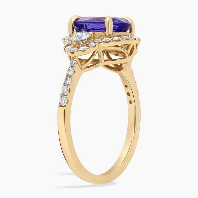 Oval Cut Tanzanite Diamond Side Stone Ring in 14k Yellow Gold (10x8mm)