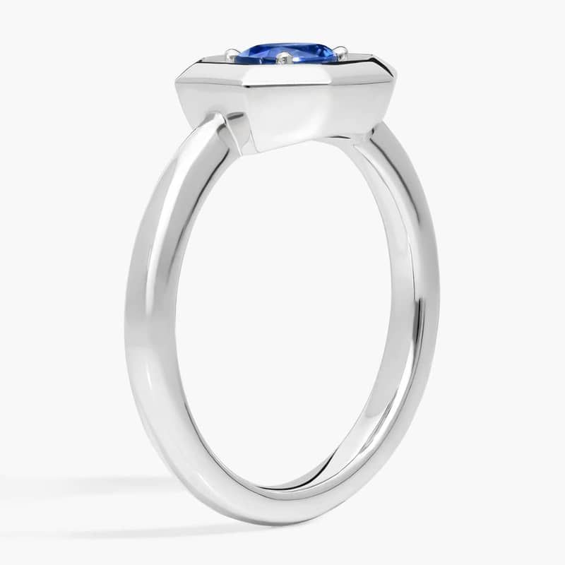East-West Oval Cut Blue Sapphire and Pavé Diamond Ring In 14K White Gold