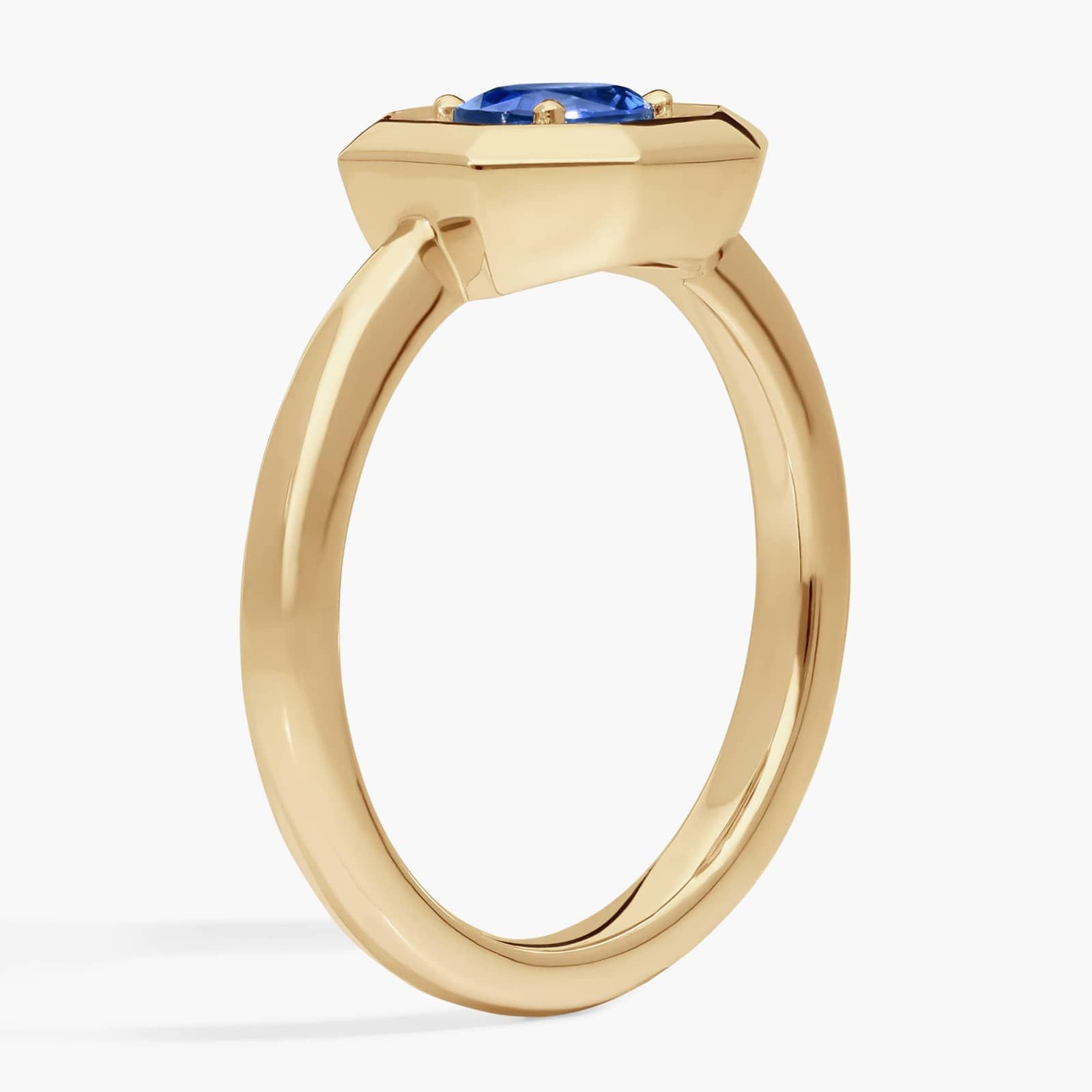 East-West Oval Cut Blue Sapphire and Pavé Diamond Ring In 14K Yellow Gold