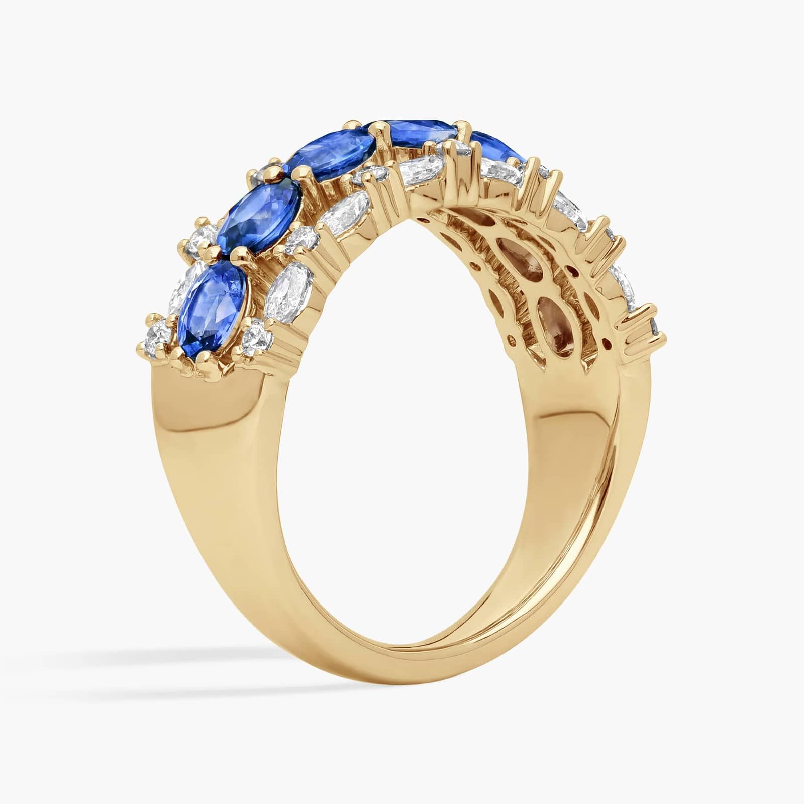 East-West Oval Cut Blue Sapphire and Diamond Ring In 14K Yellow Gold (7.25mm)