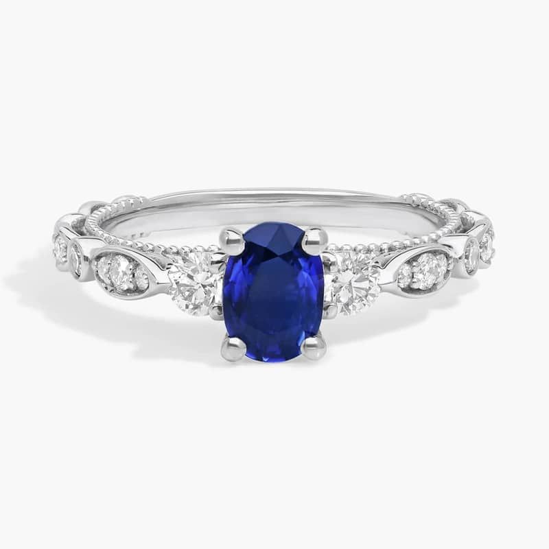 Floral Ellipse Diamond Cathedral Engagement Ring with Oval Sapphire in 14k White Gold (7x5mm)