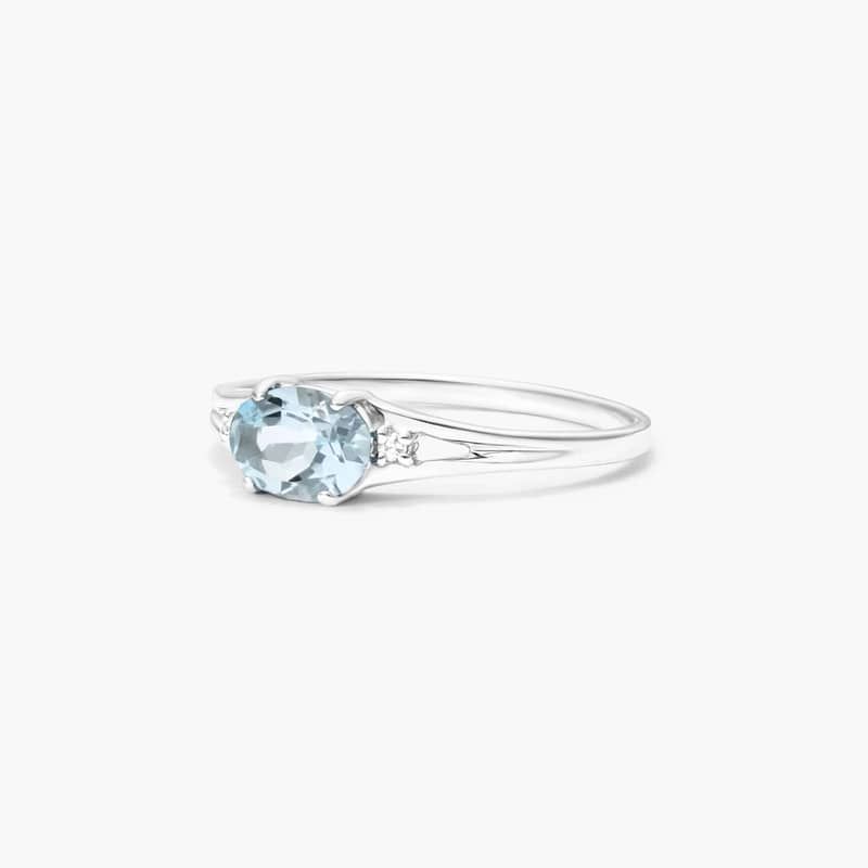 Oval Aquamarine And Diamond Accent Birthstone Ring In 14K White Gold