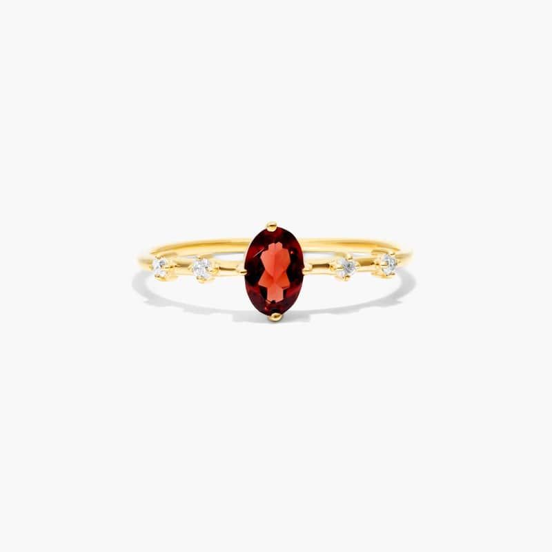 Oval Garnet And Diamond Birthstone Ring In 14K Yellow Gold