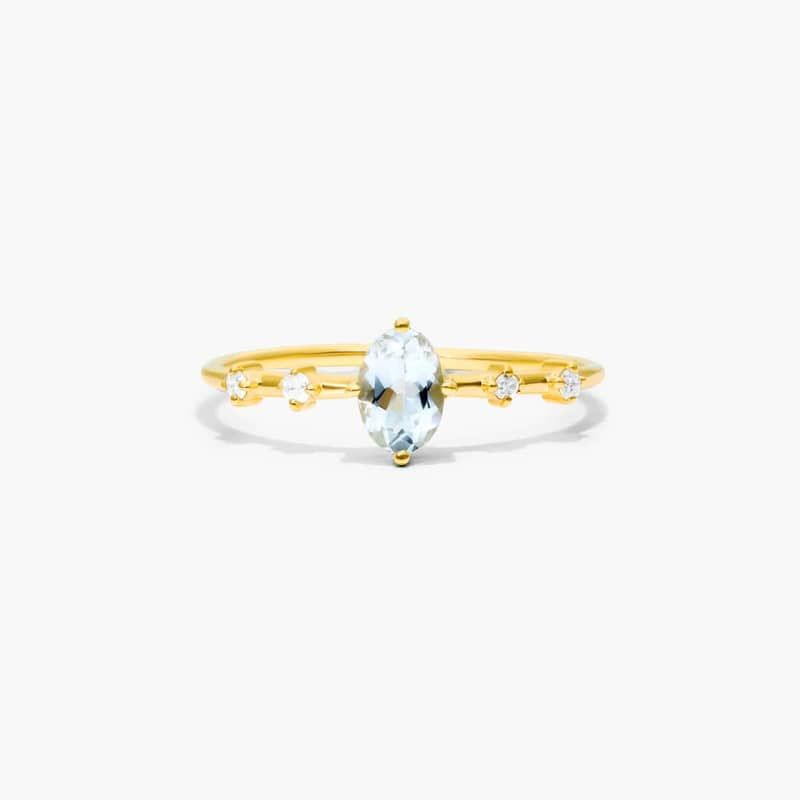 Oval Aquamarine And Diamond Birthstone Ring In 14K Yellow Gold