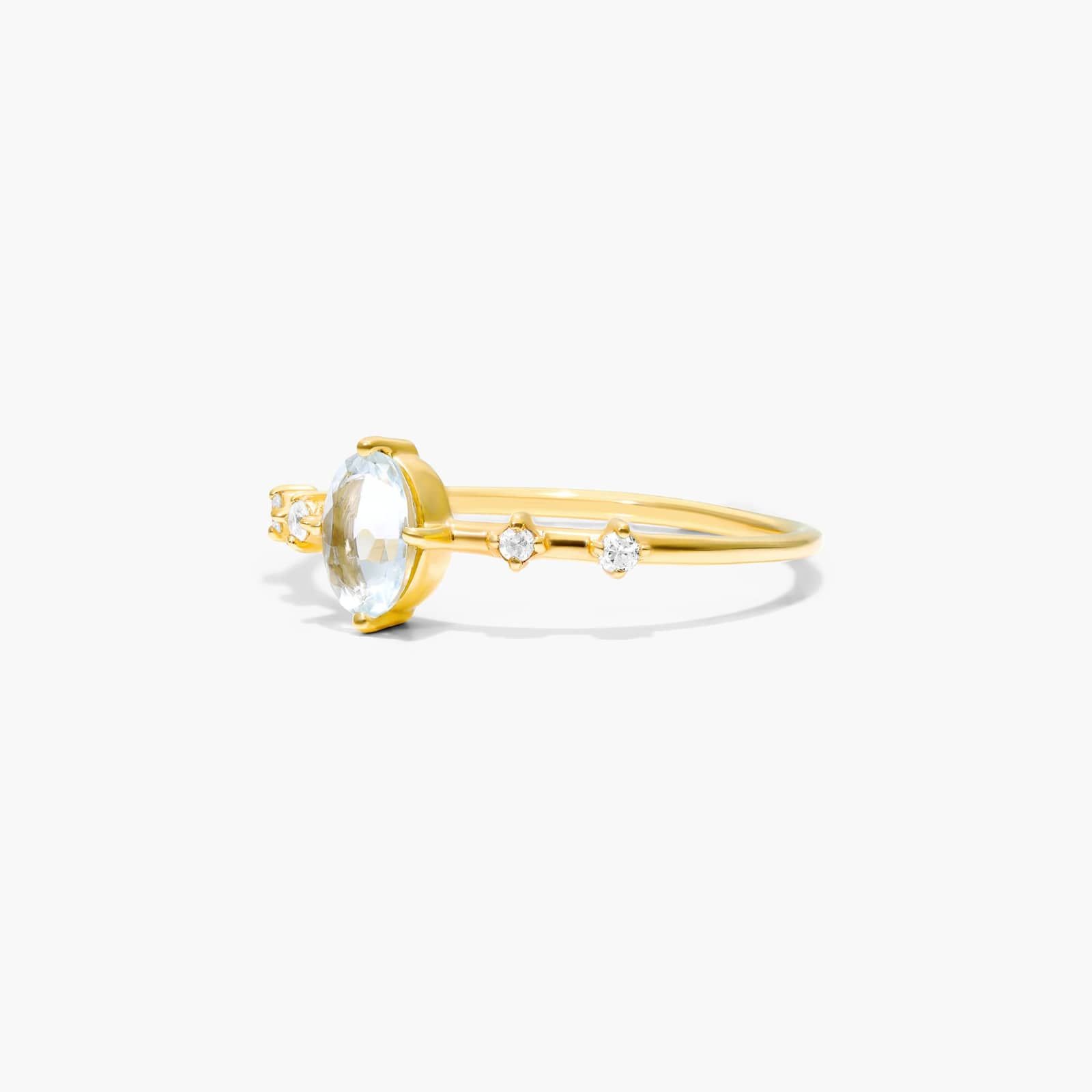 Oval Aquamarine And Diamond Birthstone Ring In 14K Yellow Gold