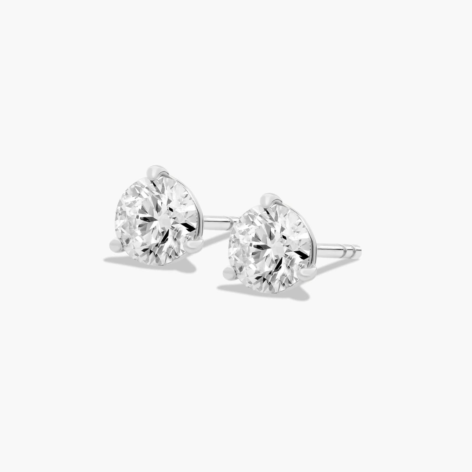 Platinum Three Prong Martini Round Brilliant Diamond Stud Earrings (1.00 CTW - F-G / VS1-VS2)