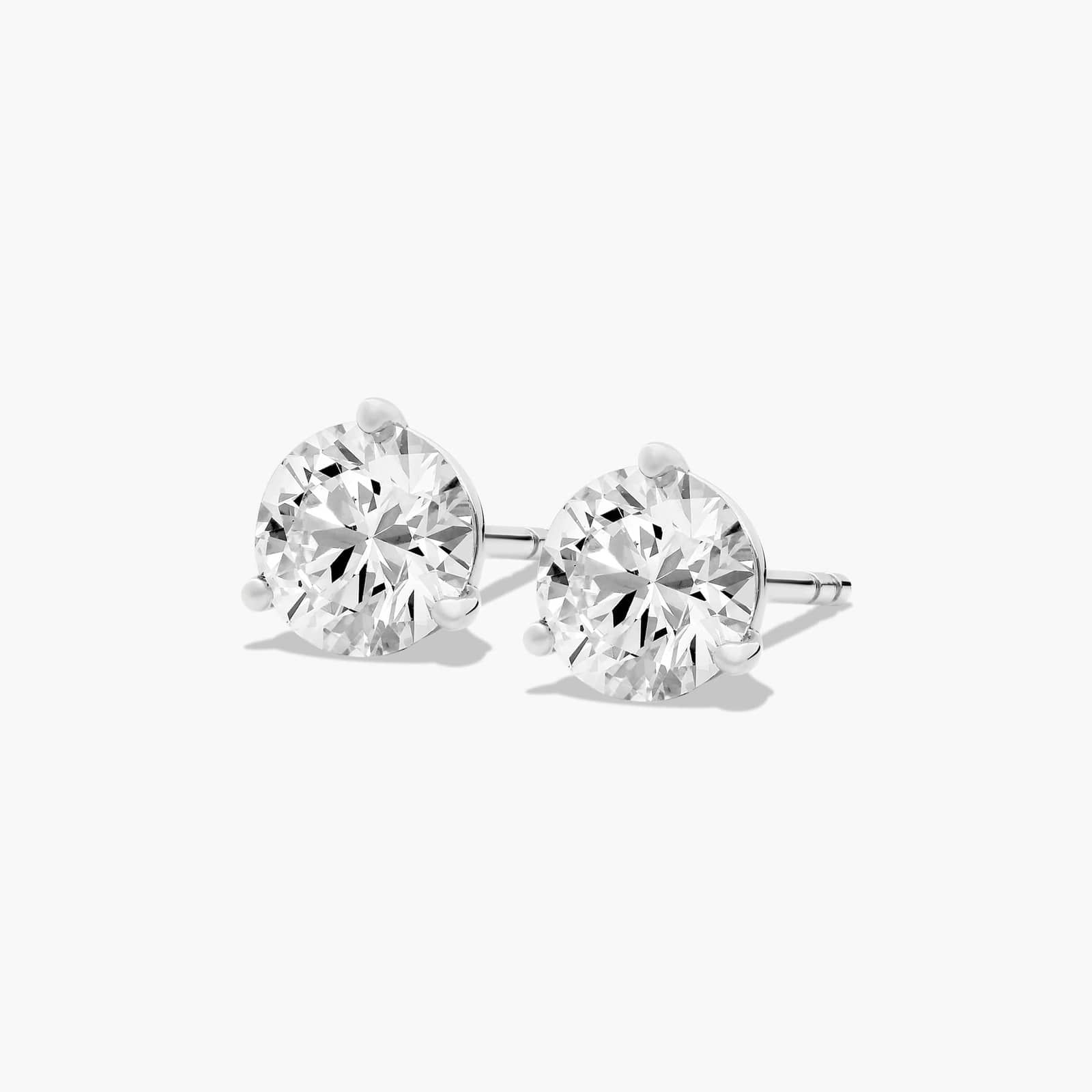 Platinum Three Prong Martini Round Brilliant Diamond Stud Earrings (1.50 CTW - F-G / VS1-VS2)