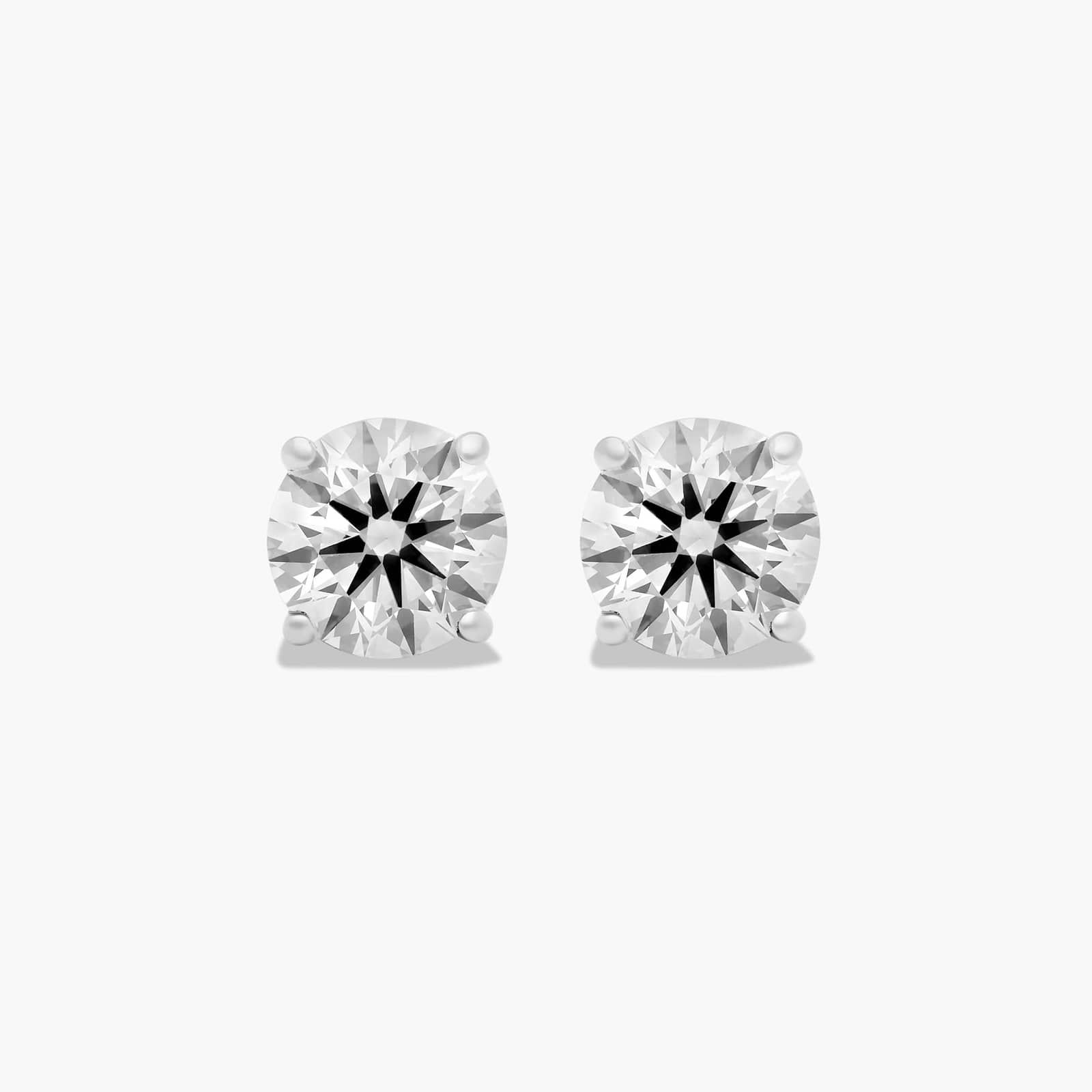 Platinum Four Prong Round Brilliant Diamond Stud Earrings (1.50 CTW - F-G / VS1-VS2)
