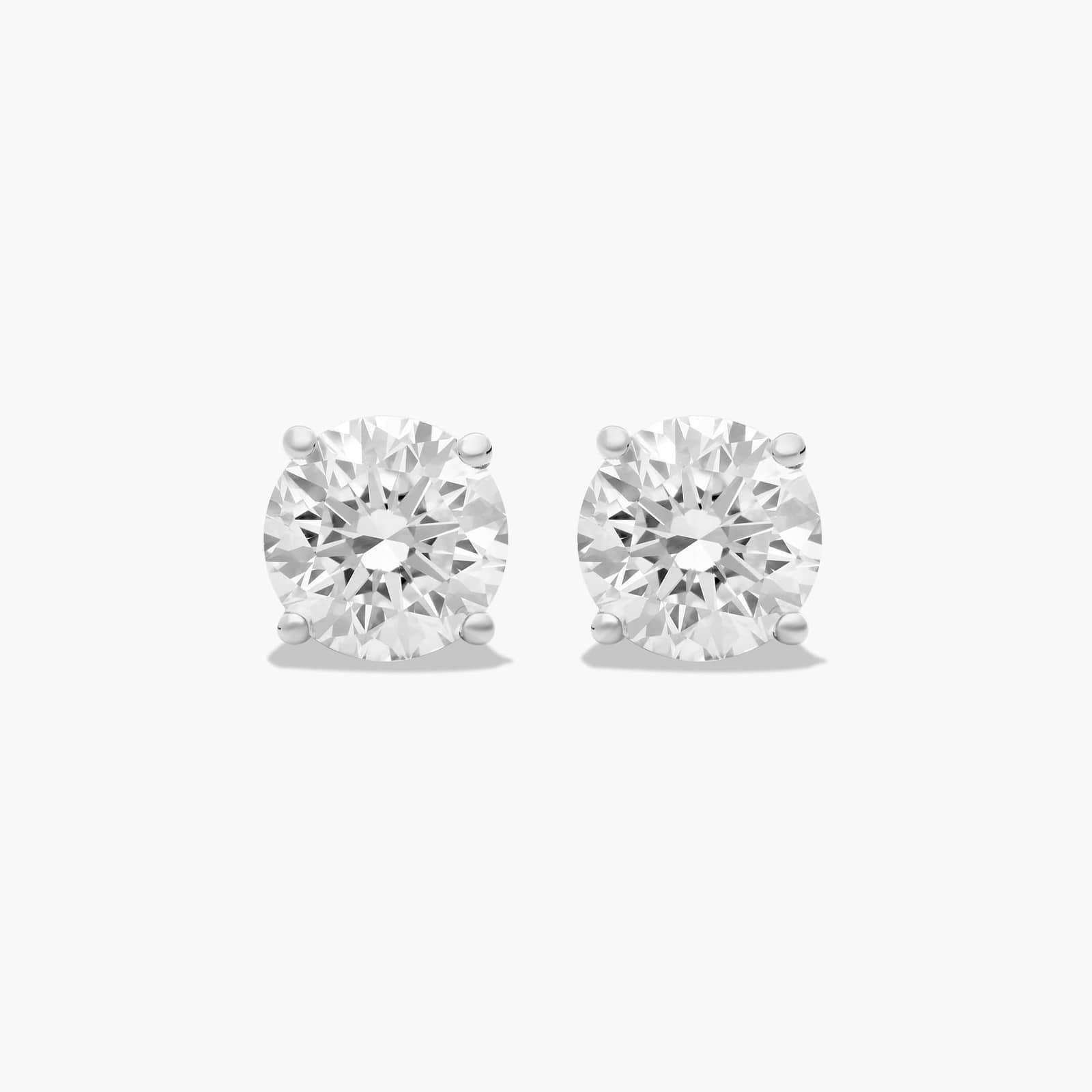 Platinum Four Prong Round Brilliant Diamond Stud Earrings (2.00 CTW - F-G / VS1-VS2)
